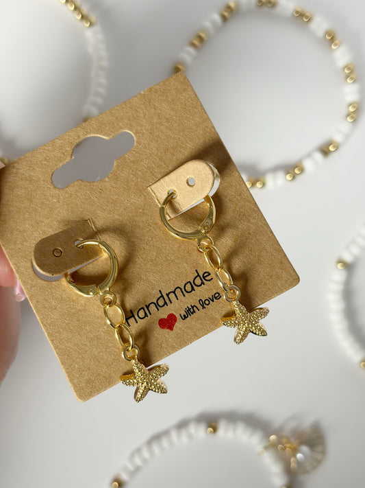 Small Gold Starfish Earrings On An 18K Gold Hoop