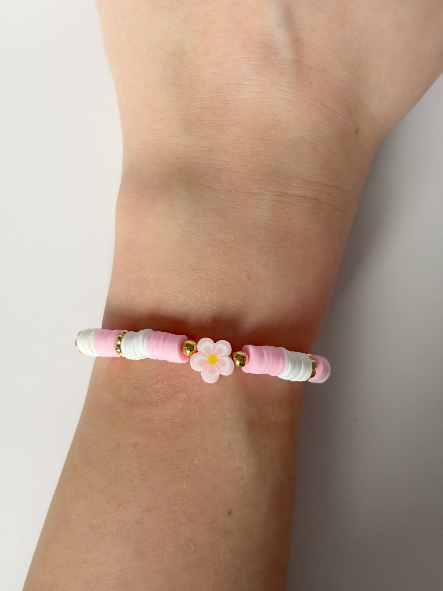 Handmade Pink And White Heishi Beaded Bracelet With Flower Detail - Lottie And Flo